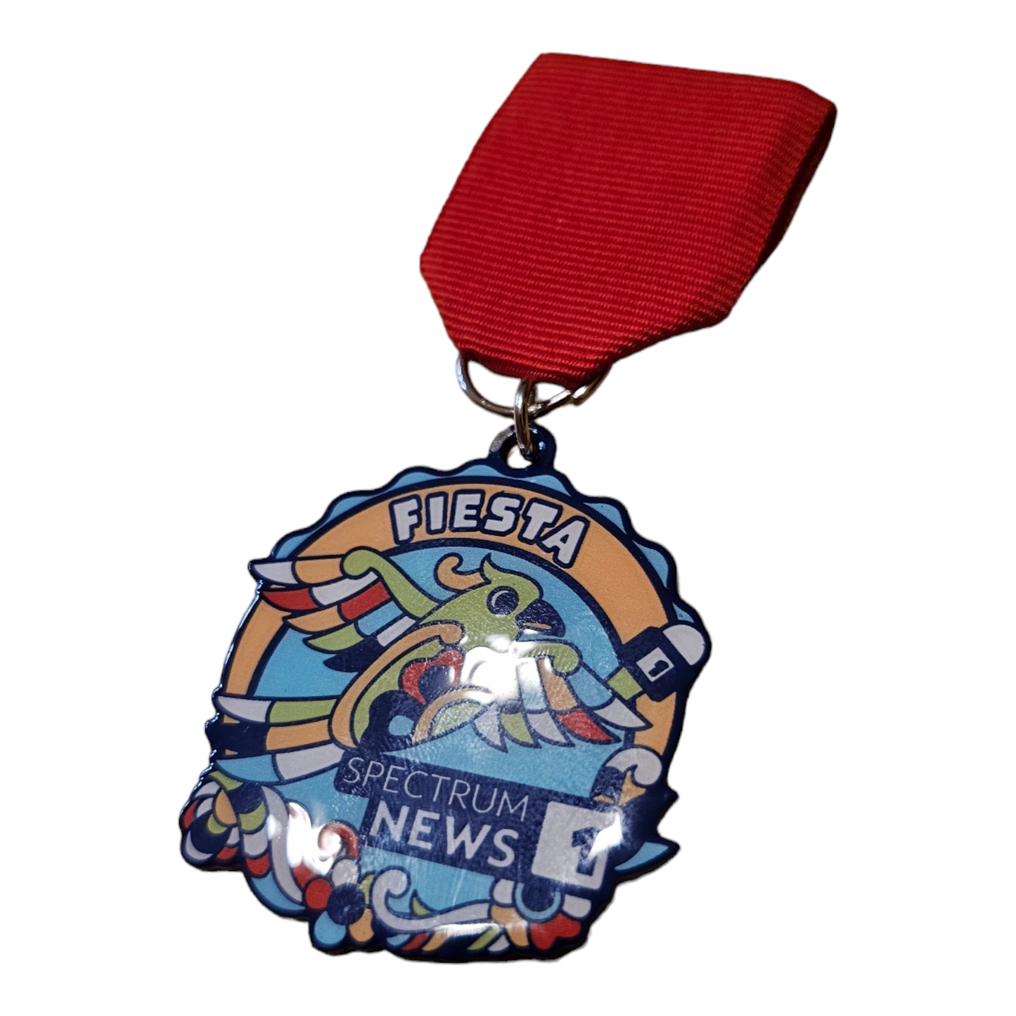 0 Spectrum News 1 "Parrot" Fiesta Medal