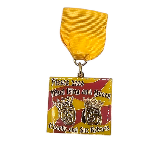 2009 Mud King and Queen Charlie and Sue Roberts Fiesta Medal